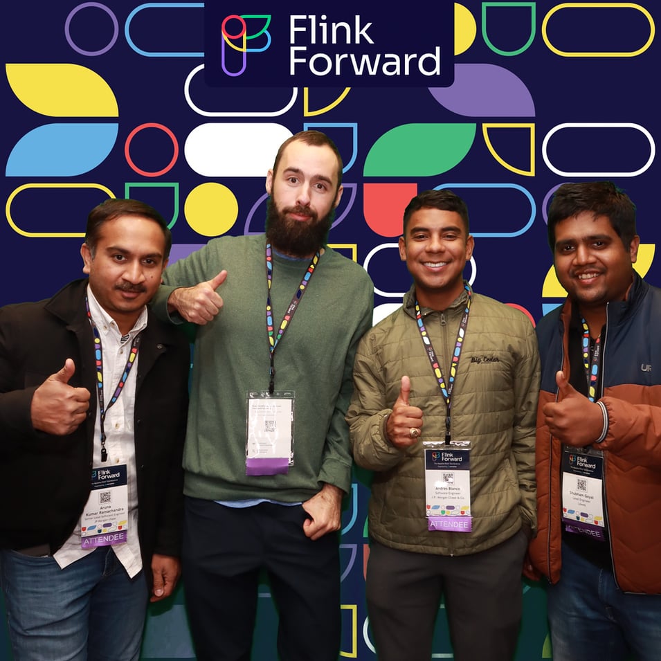 Flink Forward attendees and speakers pose for the Flink Forward photobooth.